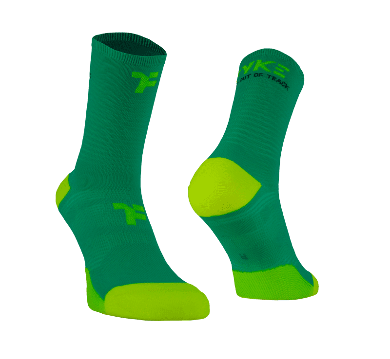 Mid socks in light green color with Fyke branding and left and right foot indication