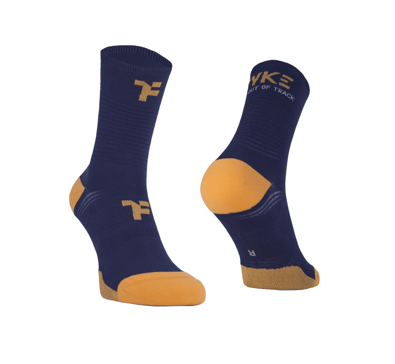 Mid socks in navy color with Fyke branding and left and right foot indication